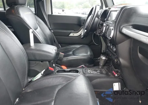 2014 Jeep Wrangler Unlimited Sahara z USA, uszkodzony, nr VIN 1C4BJWEG8EL274387